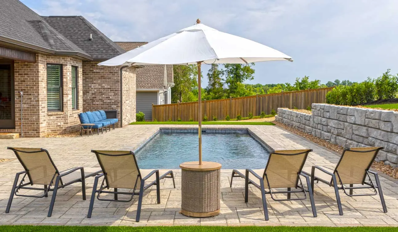 Why a Pool Shade Cover and Automatic Safety Cover Are the Perfect Pairing for Your Inground Pool